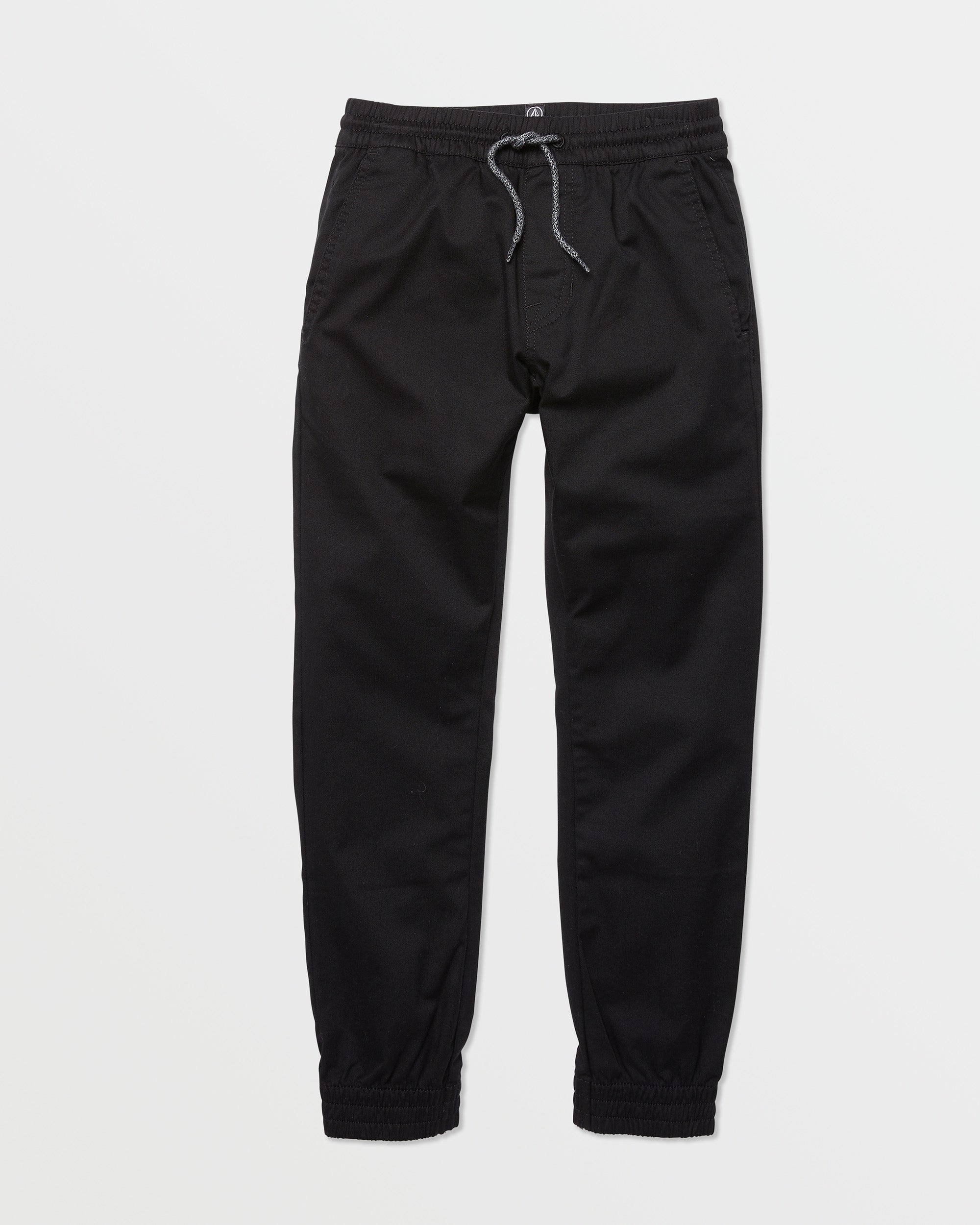 Volcom Kids' Big Boys Frickin Slim Joggers feature an elastic waist with a gray drawstring, elastic ankle cuffs, and side pockets. Made from soft recycled fibers, they're shown laid flat on a white background.