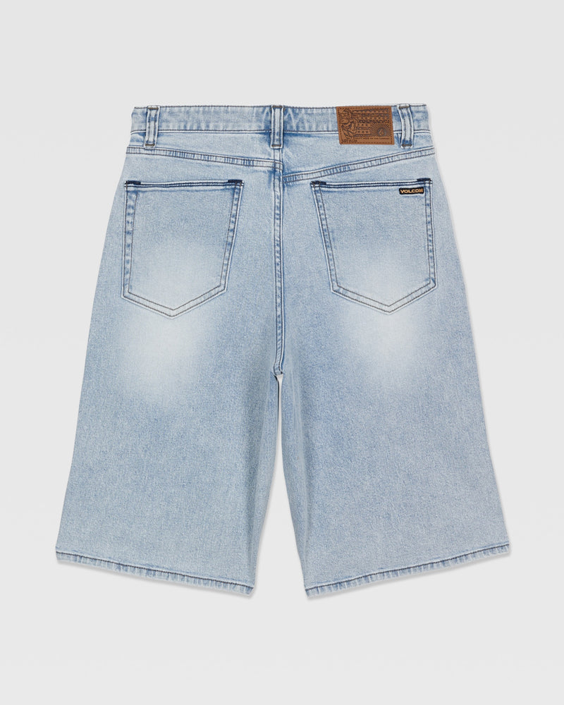 The Volcom Kids' Billow Denim Shorts in light blue feature a low-rise fit, two large back pockets, a leather waistband patch, and a small black logo tag on the right pocket.