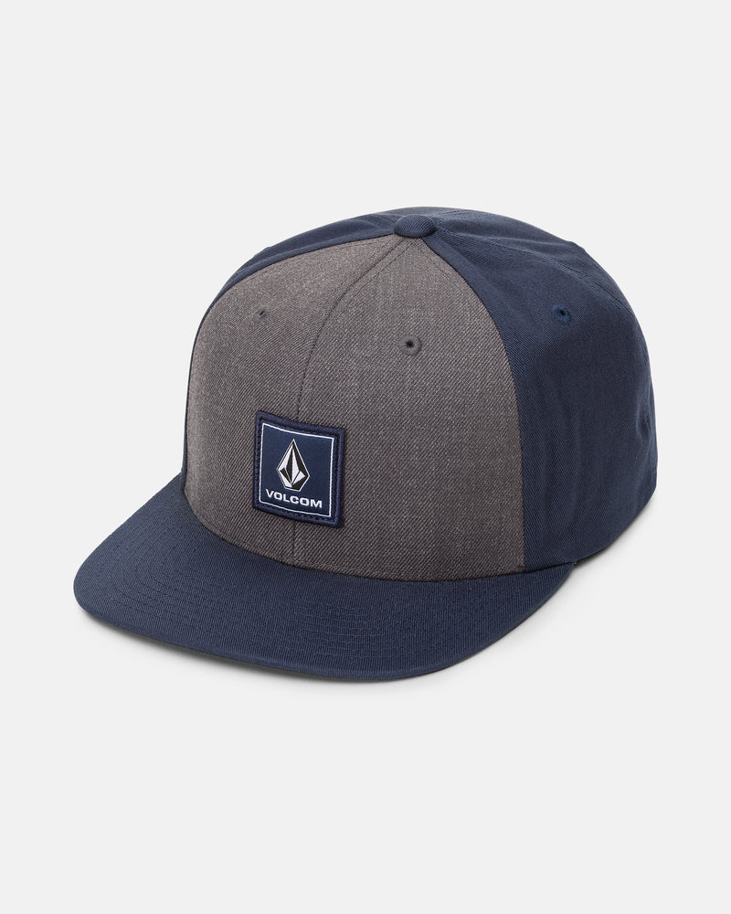 Introducing the Men’s Quarter Evo Twill by Volcom—a classic 6-panel adjustable snapback hat featuring durable twill construction. This two-tone design sports a dark blue brim and sides, gray front panels, and is finished with a square Volcom logo patch on the front for timeless style and comfort.