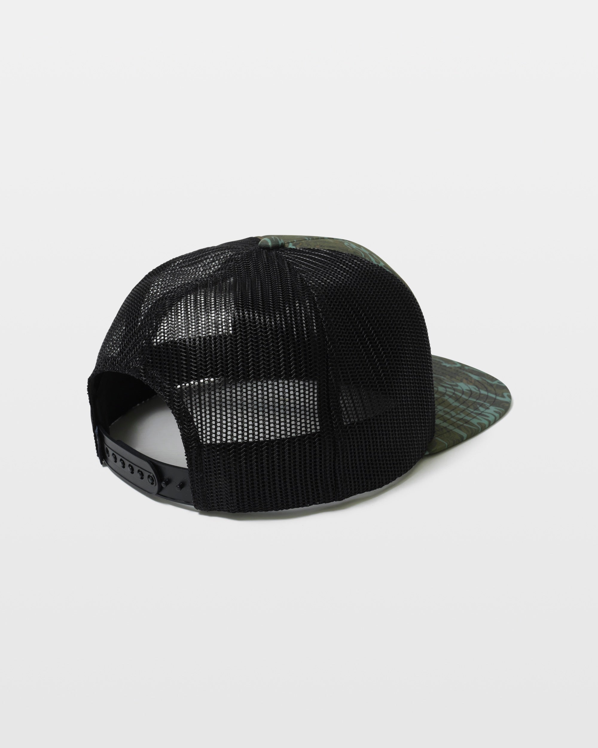The Volcom Men's Featured Artist Parillo Trucker is shown from the back, featuring a camouflage-patterned brim and front panel, black mesh material, and an adjustable snap closure. The background is plain white.