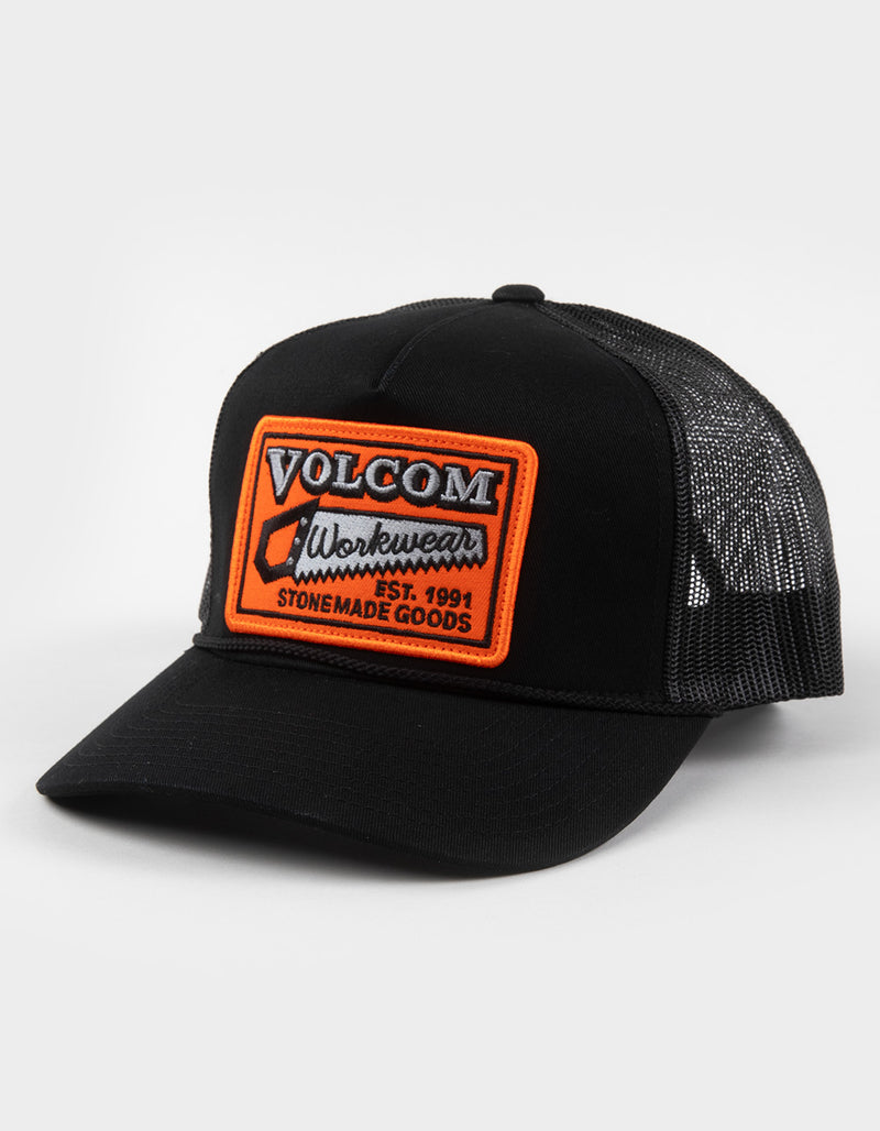 The Men's Sawstone Trucker Hat features a breathable mesh back, curved brim, and an orange, white, and black Volcom Workwear logo patch on the front with "Est. 1991 Stonemade Goods.
