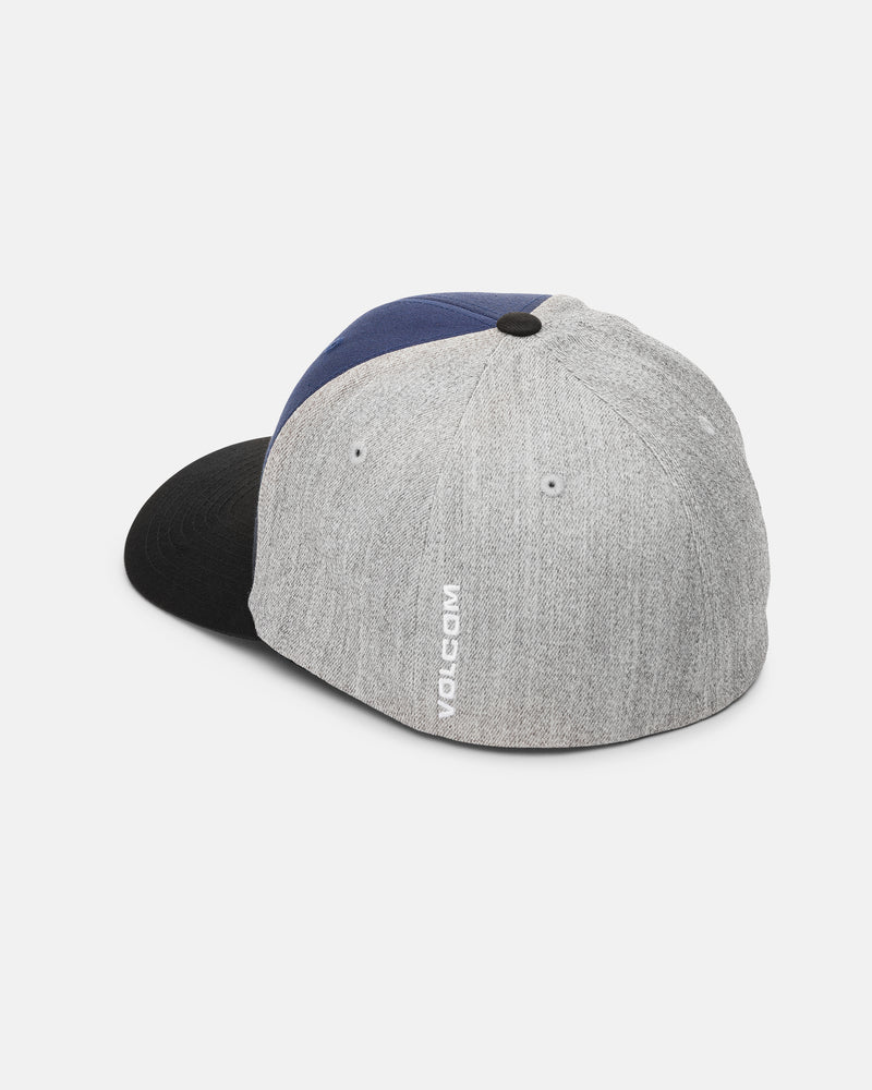 Gray and navy Men’s Full Stone Heather Flexfit Hat by Volcom with a black bill, viewed from the back at an angle. The word VOLCOM is printed in white on the back gray panel of this structured snapback.