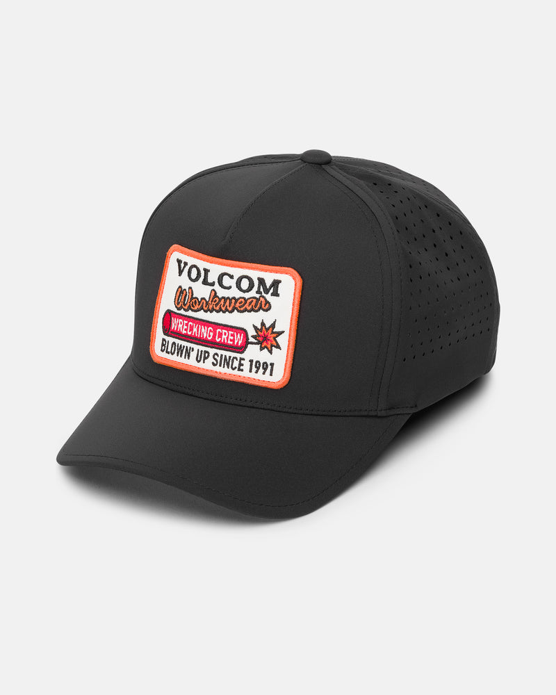 Introducing the Men’s Wrecker Workwear Vent Delta Adjustable by Volcom—a black trucker hat featuring a mesh back and a distinctive front patch that reads “VOLCOM Workwear WRECKING CREW BLOWN UP SINCE 1991,” complete with a bold red starburst graphic. Crafted from lightweight performance fabric and designed for adjustability, this hat delivers lasting comfort and authentic workwear style.