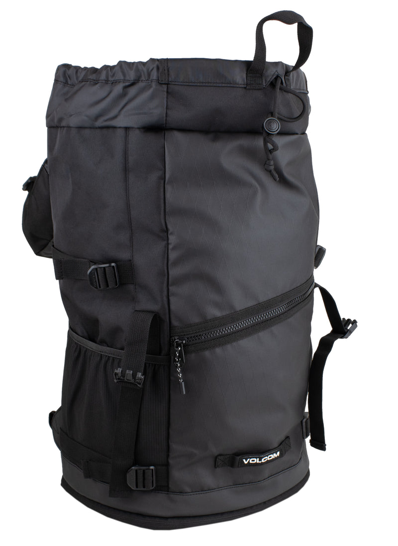 The Men’s Litestone Gear Pack by Volcom is a large black backpack with organized storage, multiple compartments, zippers, side pockets, adjustable straps, and a top handle—durable for outdoor or travel use.