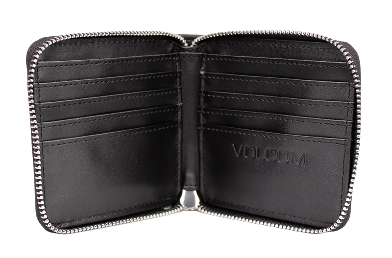 Here’s the rewritten sentence using your product data: Open Women's Studette Wallet by Volcom in black leather, featuring a zipper closure, eight card slots, and "VOLCOM" embossed on the inside right panel. This compact wallet is shown empty against a white background.