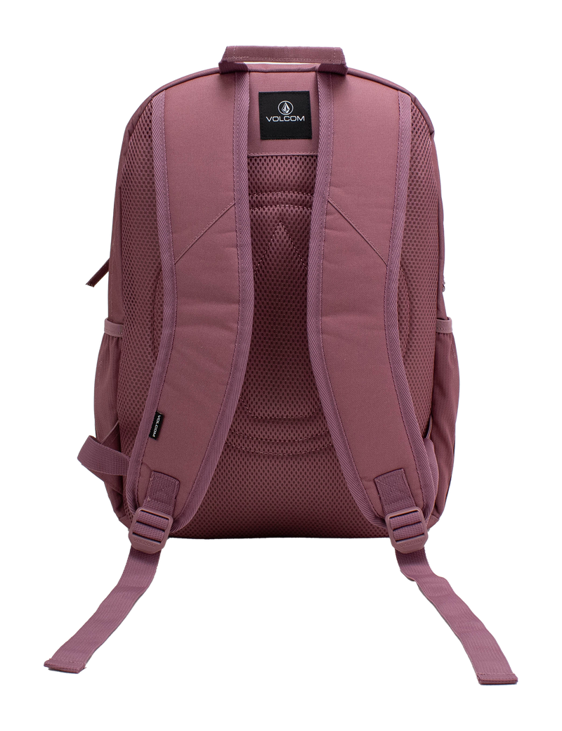 The Volcom Women's Study Buddy Backpackq in mauve is displayed from the back against a white background, highlighting its padded shoulder straps, mesh back panel, interior padded laptop sleeve, and adjustable bottom straps.