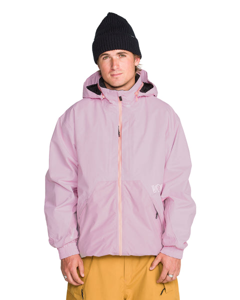 A person wearing a light pink Men’s Longo Gore-Tex Jacket with a front zipper and tan pants.