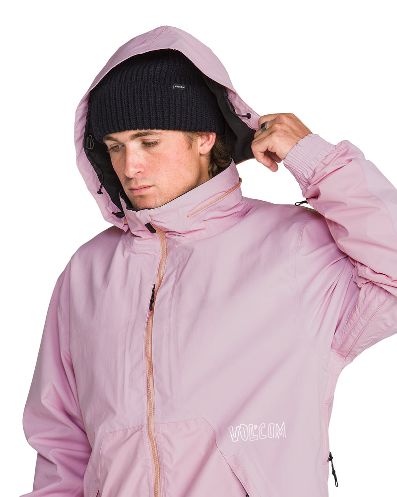 A person in a black beanie wearing a pink Men’s Longo Gore-Tex Jacket, pulling the hood over their head.