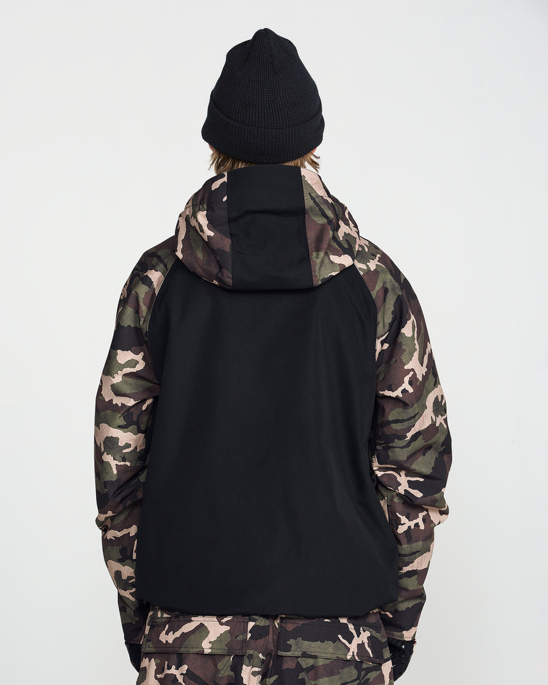 A person stands with their back to the camera against a plain white background, wearing a black beanie and the Volcom Men’s Collins 20K Jacket—a camouflage-patterned jacket featuring black paneling.