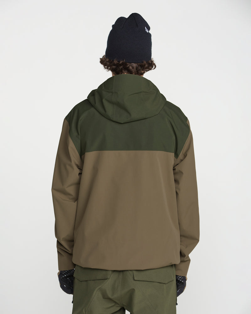 A person is shown from the back against a plain white background, wearing a black beanie and matching pants, along with the Volcom Men’s Buckthreeeighty Jacket—a baggy fit, two-tone green and brown hooded V-Science 2-Layer jacket.