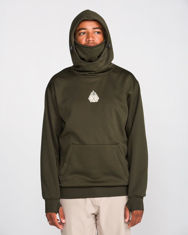 A person wearing the Volcom Men’s Hydro Riding Hoodie in olive green, featuring a built-in face covering and crafted from hydrophobic fleece, stands against a plain light background. The hoodie displays a small geometric logo on the chest.