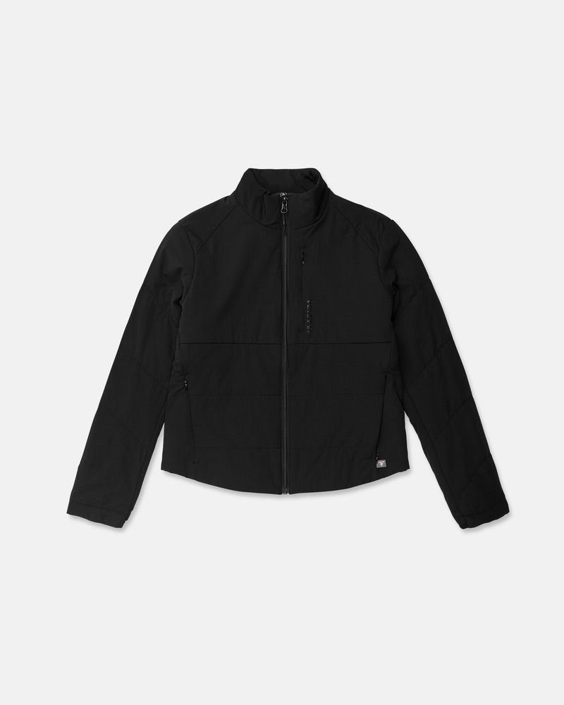 The Volcom Women’s Evergreen Full Zip Jacket, featuring a high collar, long sleeves, and side pockets, is displayed on a plain white background with minimal branding near the bottom hem.