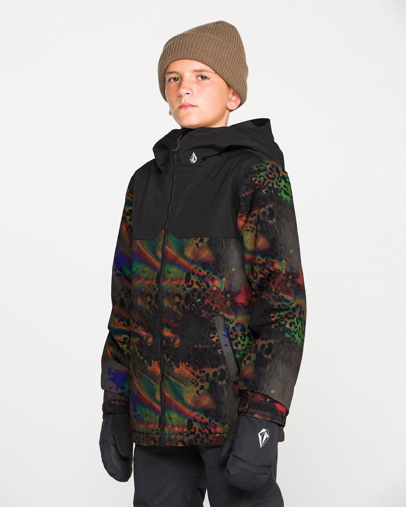 A boy stands facing forward against a plain white background, wearing a brown knit beanie, black pants, gloves, and the Volcom Kids’ Youth Stone.91 Insulated Jacket—a colorful patterned winter coat with a black hood. This youth snow jacket features recycled insulation and Grow-Tech technology for long-lasting warmth and comfort.