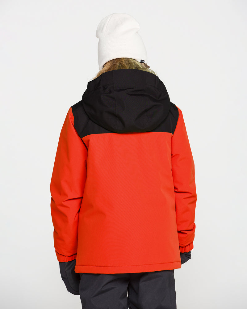 A person is seen from behind standing against a plain white background, wearing the Volcom Kids’ Youth Stone.91 Insulated Jacket in red and black with recycled insulation, paired with a white beanie and black gloves.
