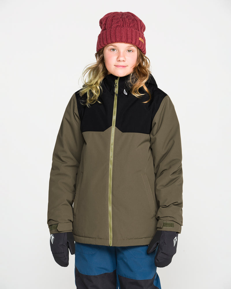 A child wearing a maroon knit beanie, black gloves, blue pants, and the Volcom Kids’ Youth Stone.91 Insulated Jacket in an olive and black colorway with recycled insulation stands facing forward against a plain white background.
