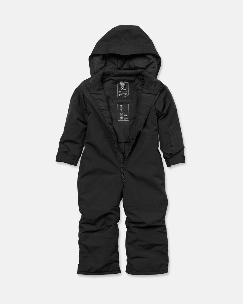 A Volcom Kids’ Little Little Flurry One Piece Snow Suit in black is displayed laid flat, unzipped, showcasing its long sleeves and pant legs. The inside tag is also visible.
