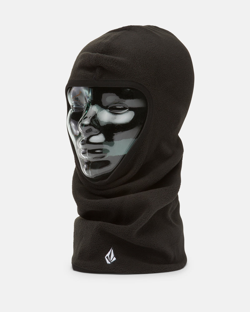 The Volcom Men’s Powclava, a black polyester fleece balaclava, is shown on a transparent mannequin head and displays a small white Volcom logo near the bottom edge.