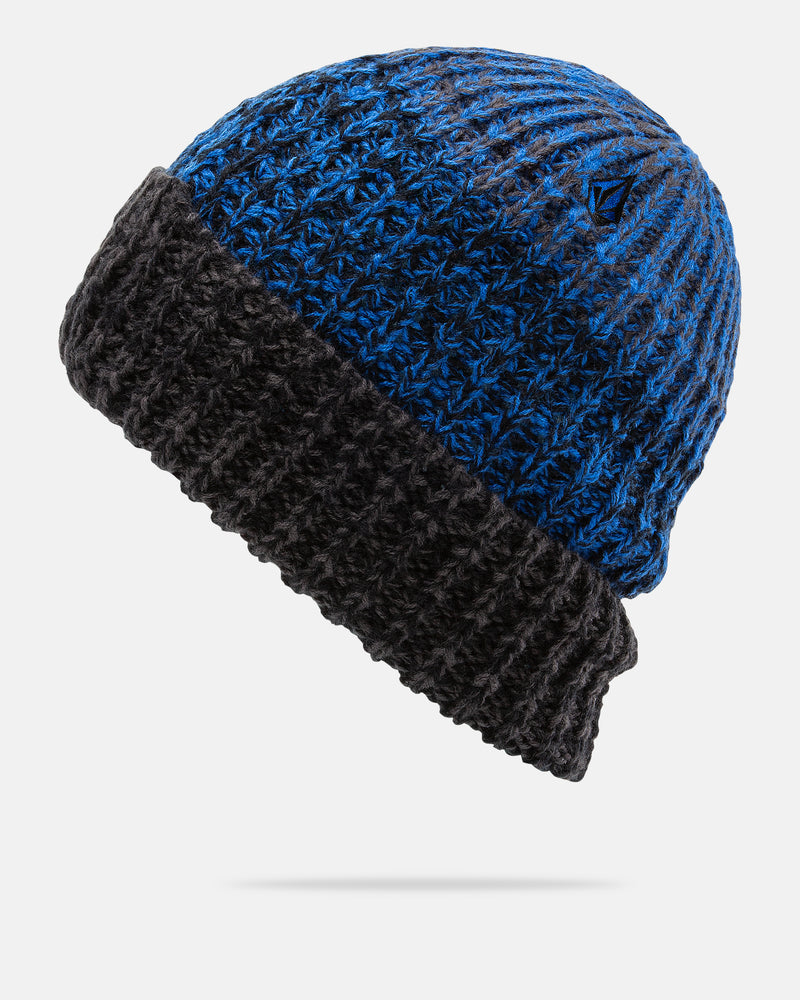 The Volcom Men’s Stone Chroma Beanie is a blue and black knitted hat with a folded brim, showcasing a textured pattern and a subtle front logo. Designed for comfort, this beanie offers a relaxed slouch fit and is displayed against a plain white background.