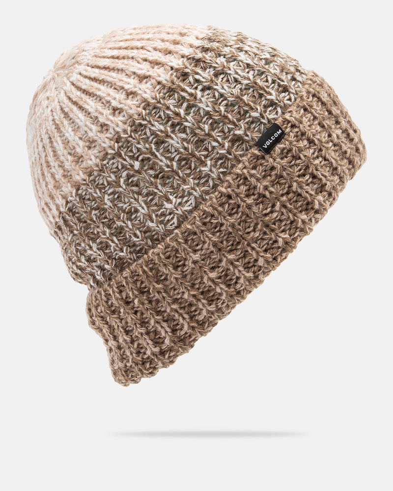 The Volcom Men’s Stone Chroma Beanie is a knitted hat in beige, tan, and cream tones, featuring a comfortable slouch fit with a folded brim and finished with a small black Volcom tag on the cuff. It is displayed on a white background.