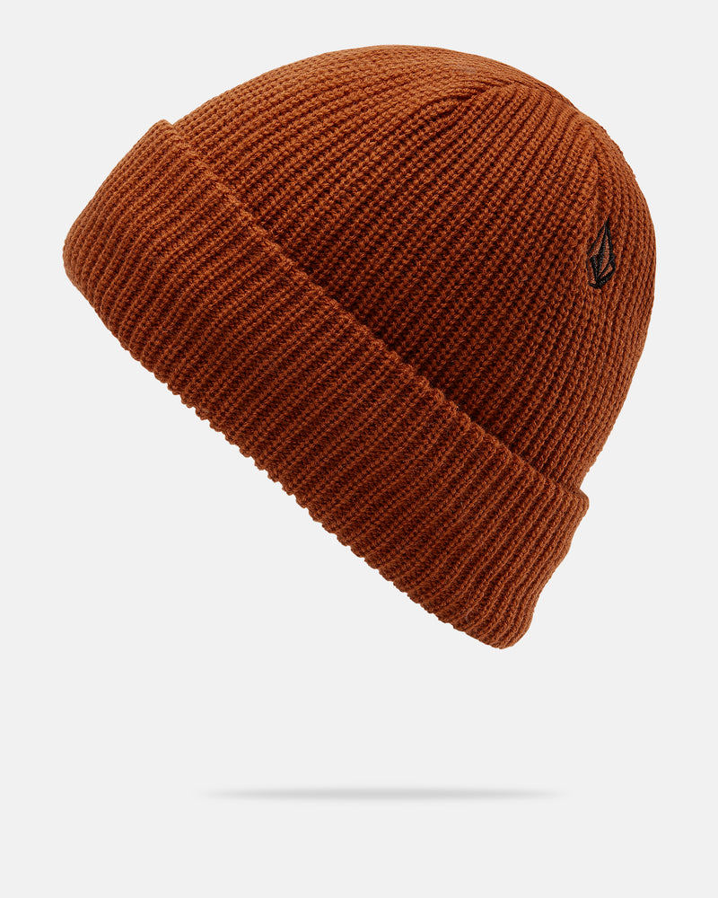 The Men’s Sweep Lined Beanie by Volcom is a rust-colored knit beanie with a folded brim, featuring a small black embroidered Volcom logo on the side and a cozy fleece lining, shown against a plain white background.