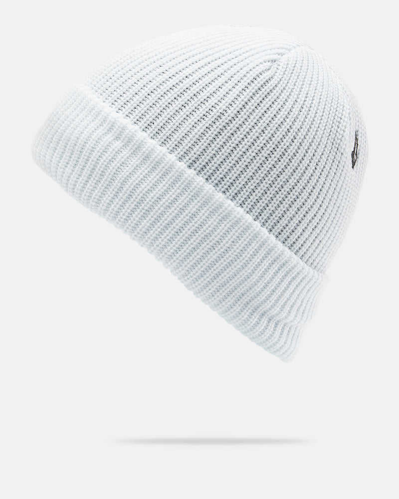 The Men’s Sweep Lined Beanie by Volcom is shown in light blue ribbed knit with a folded brim on a white background. A small black and white Volcom logo patch is placed above the brim, and the beanie appears to float with a shadow beneath it.