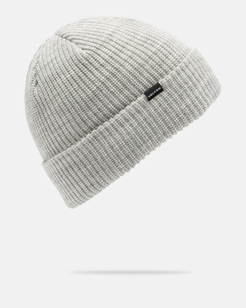 The Men’s Sweep Beanie by Volcom features a light gray ribbed knit construction in a standard fit, complete with a folded brim and a small black Volcom logo tag on the front. Crafted from cozy acrylic, this beanie is showcased on a white background with a subtle shadow underneath.
