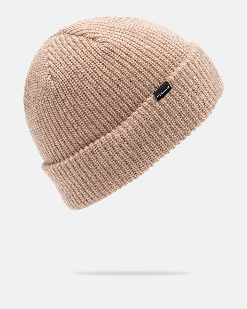 The Volcom Men’s Sweep Beanie, shown here in beige, features a folded cuff with a small black rectangular Volcom label sewn onto it. Displayed on a white background, this standard fit beanie combines warmth and style with ease.
