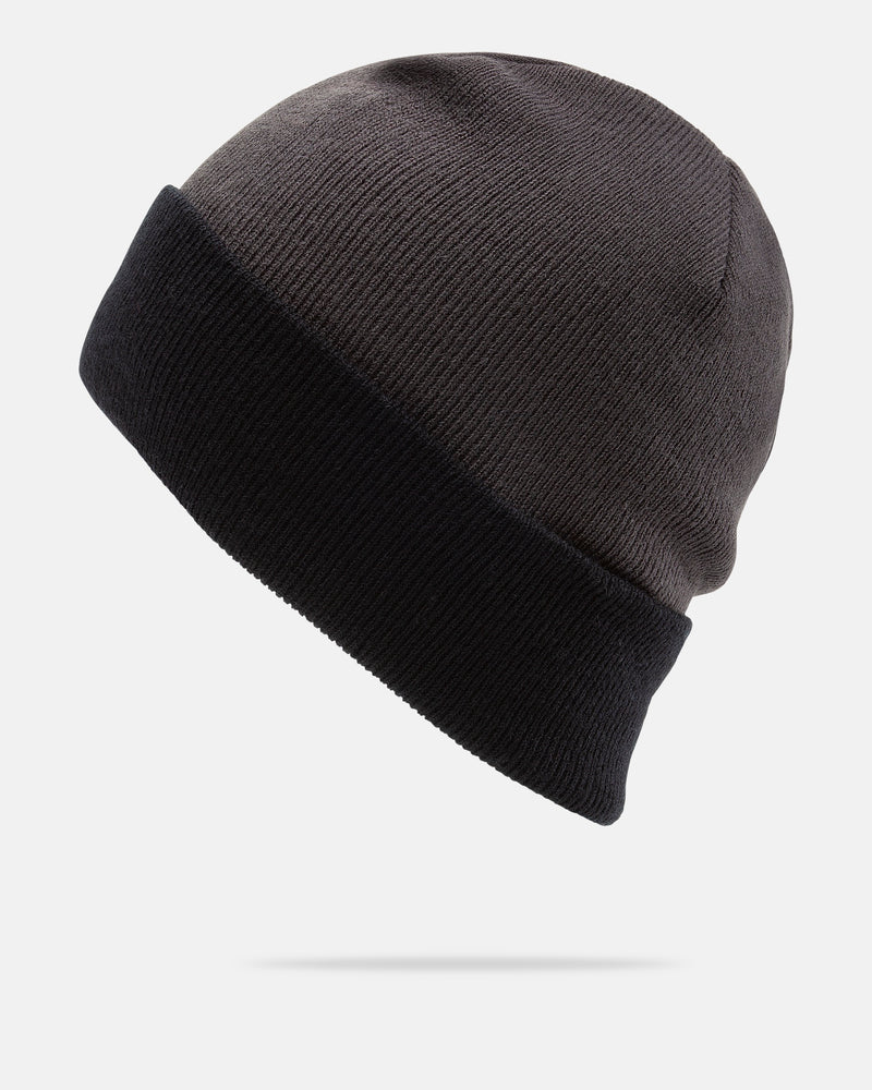 The Volcom Men’s Team Beanie, featuring a dark gray knit design and a wide black folded cuff, crafted from soft acrylic, is displayed against a plain white background.