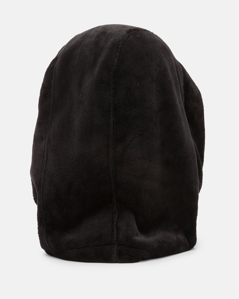 The Volcom Women’s Dang Hood in black plush fleece is displayed from the back against a plain white background. The soft, fuzzy fabric is ideal for cold weather, and the hood features a simple design with no visible fasteners or embellishments.