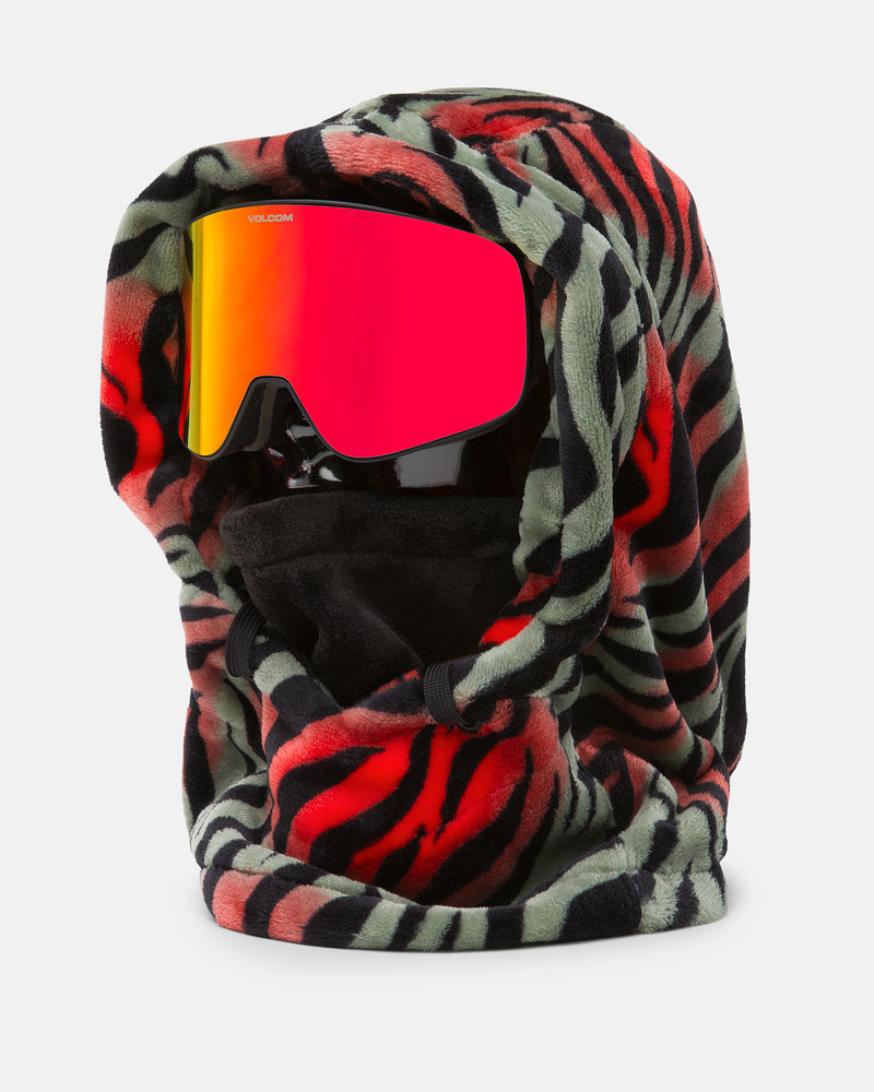 A mannequin head wears the Volcom Women’s Dang Hood—a fuzzy, tiger-patterned fleece hood with black, red, and greenish stripes that covers the head and neck for cold weather—paired with red-tinted ski goggles. This cozy design also functions as a neck warmer, ensuring warmth and style in chilly conditions.