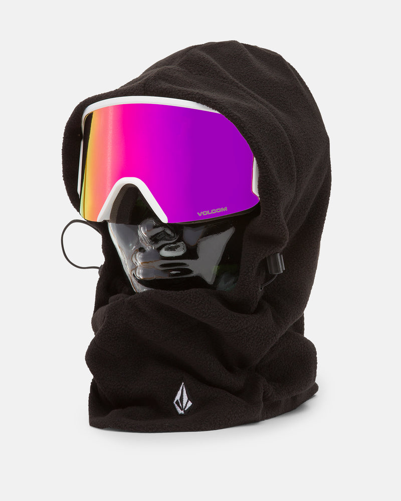 A black mannequin head displays the Women’s V.Scout Hood by Volcom, crafted from soft black fleece and paired with pink reflective ski goggles. This pull-over hood covers the neck and part of the face, serving as a fleece neck warmer and showcasing a small embroidered logo on the front.