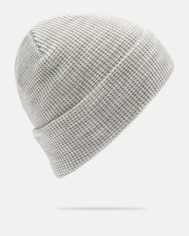 Light gray Women’s Power Beanie by Volcom with a folded brim, displayed against a white background. This acrylic beanie features a waffle texture and is shown floating with a subtle shadow beneath—ideal for on-mountain sessions or everyday wear.