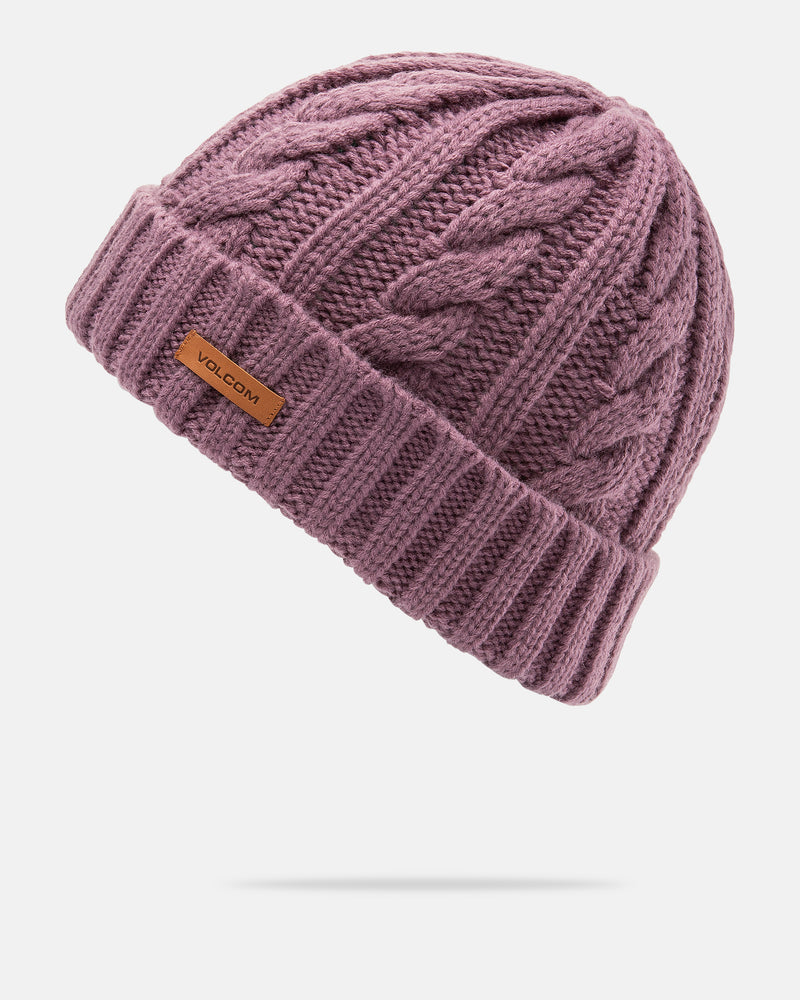 The Women’s Stone Knit Beanie by Volcom is a purple cable-knit beanie featuring a folded brim and a small brown Volcom label on the front, shown against a white background.