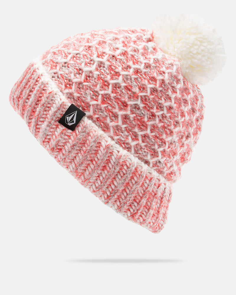 The Volcom Women’s Frosty Top Beanie is a pink and white knit hat featuring a folded brim, a white faux fur pom-pom, and a small black Volcom logo tag on the front—making it the perfect stylish accessory for cozy winter days.