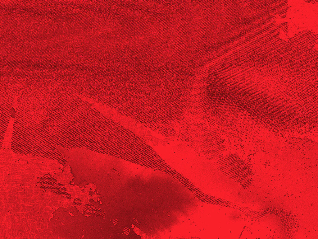 Abstract red textured background with various shades of red, including areas of light and dark, subtle grainy patterns, and some smudged and splattered effects throughout.