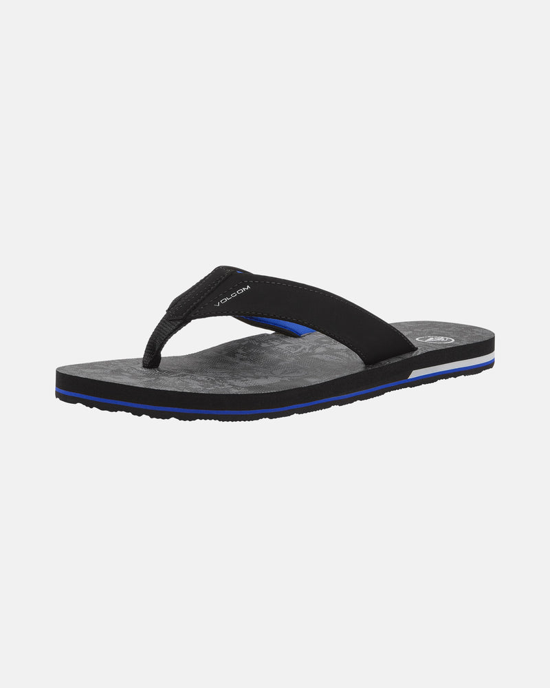 The Volcom Men's Victor Sandals feature a black design with a fabric thong strap, cushioned Recliner Comfort Foam sole, and blue edge accent. Water-friendly, they're shown on a plain white background.