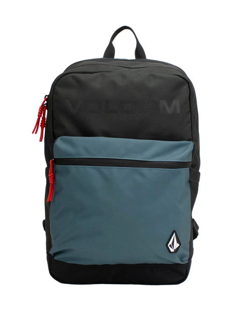 A Volcom Men's School Backpack in black and teal, featuring a front zip pocket, red zipper pulls, and the Volcom logo on the lower right corner, designed with ergonomic straps for comfortable carrying and a padded laptop sleeve for tech protection.