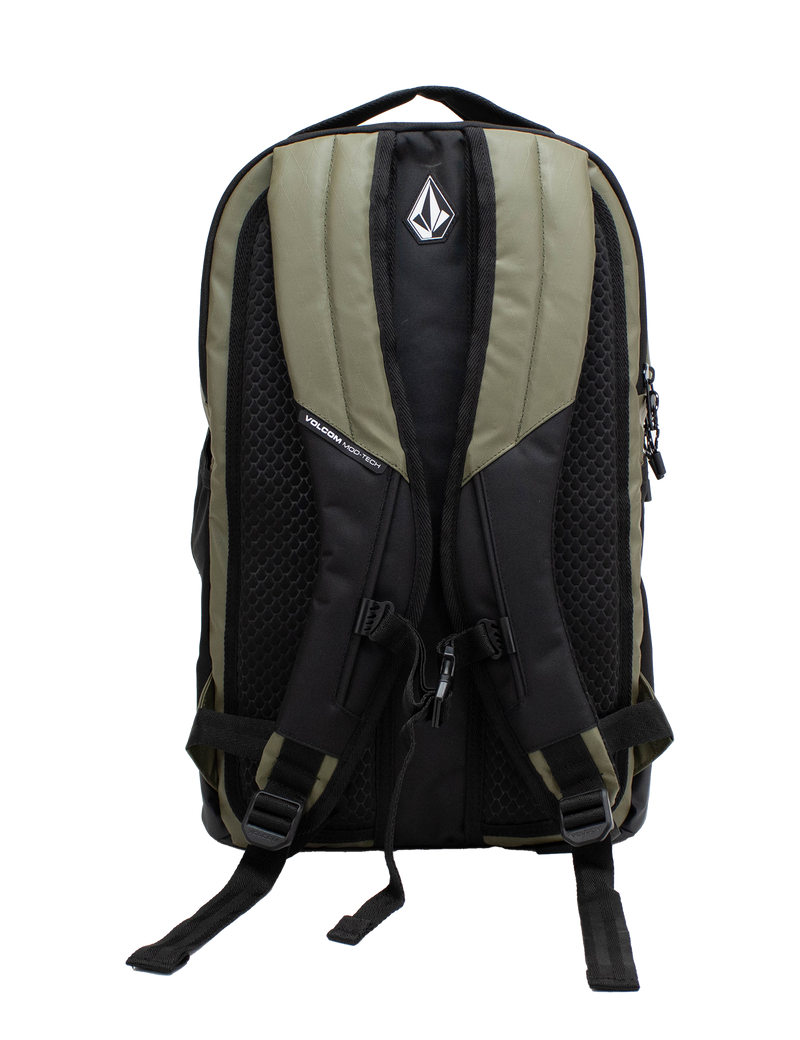 Presenting the Volcom Men's Venture Backpack in black and olive green, featuring padded shoulder straps, mesh backing, and a distinctive geometric logo on the top pocket. This backpack offers a spacious 22L capacity and includes a padded laptop sleeve, shown photographed against a plain white background.