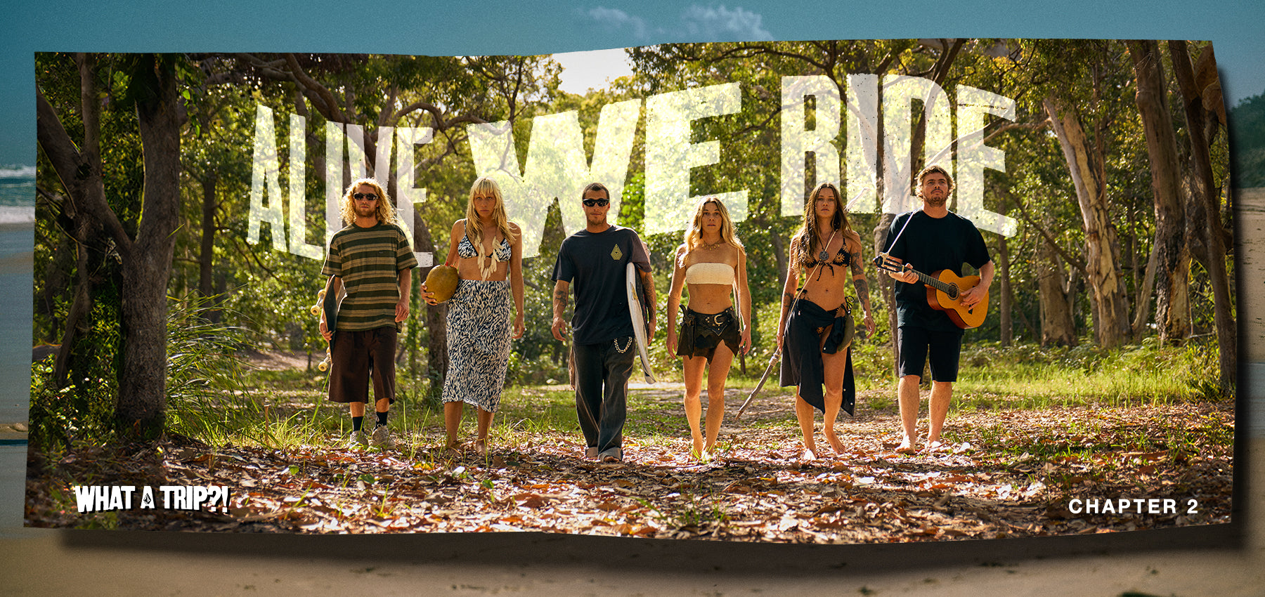 Group of people standing outdoors with 'All We Ride' text in the background