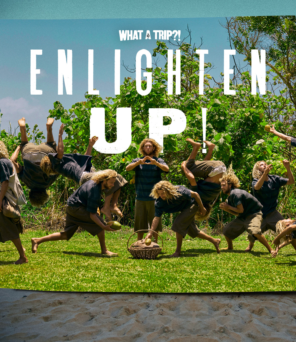 Group of people in a dynamic pose with 'ENLIGHTEN UP' text and 'WHAT A TRIP!!?' slogan.