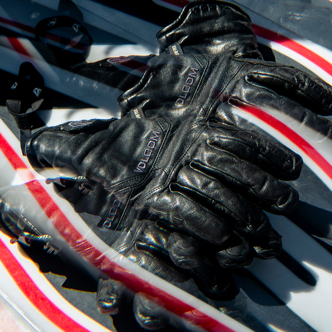 Close-up of black Volcom snow gloves outside