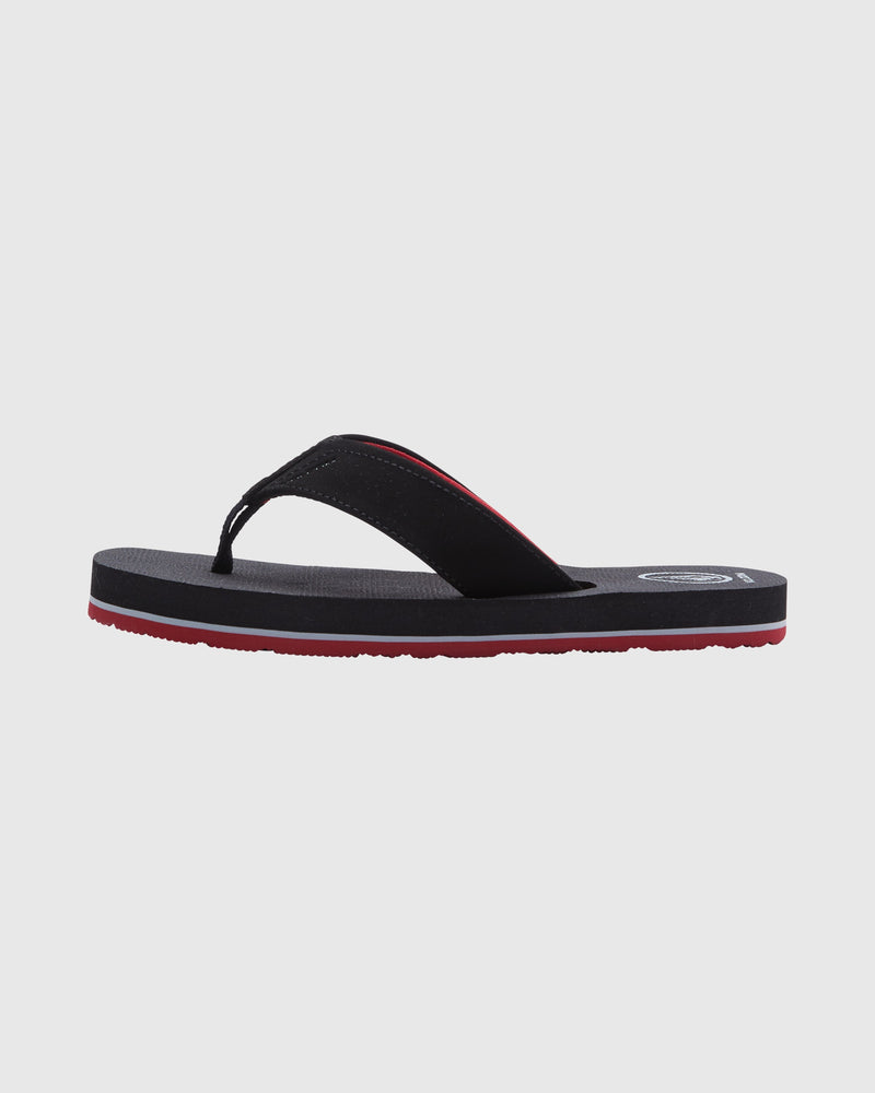 The Volcom Kids' Victor Big Youth sandal is a black flip-flop with a red stripe along the sole, shown in side profile on a plain white background. It features a water-friendly footbed for all-day comfort.