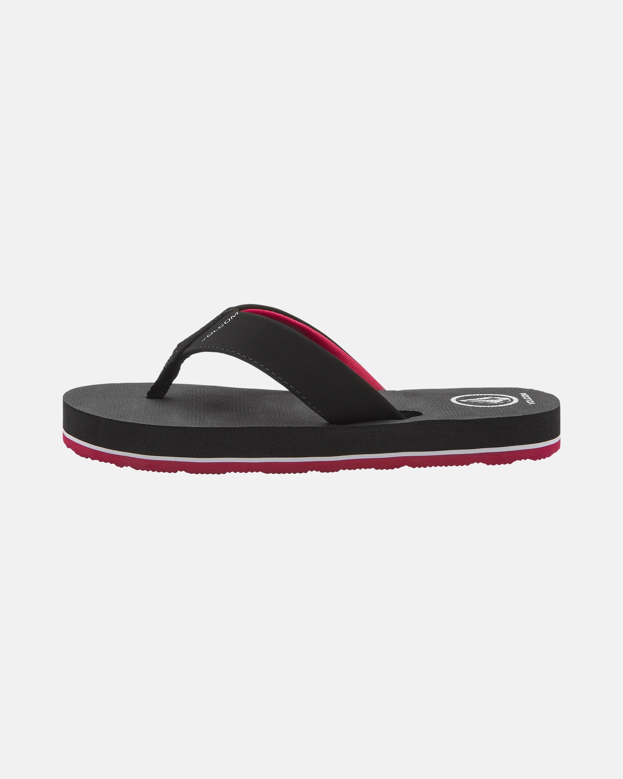 The Volcom Kids' Victor 2 Big Youth sandal features black straps with pink lining and a pink sole, designed for recliner-level comfort. Shown in a side profile on a plain white background.