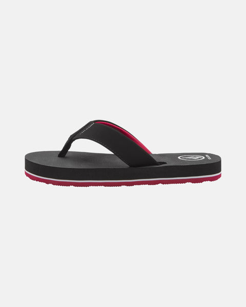 The Volcom Kids' Victor 2 Big Youth sandal features black straps with pink lining and a pink sole, designed for recliner-level comfort. Shown in a side profile on a plain white background.