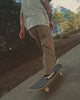 Video of person in white t-shirt and jeans skateboarding, ending with text "Volcom Brand Road-Tested Jeans & Pants"